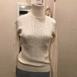 Beautiful cream colored textured turtleneck from Dress Barn. Size M